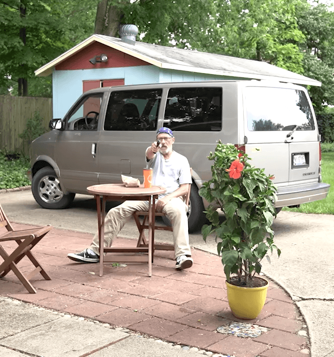 Simulator scenario: subject seated outside a van in a suburban setting